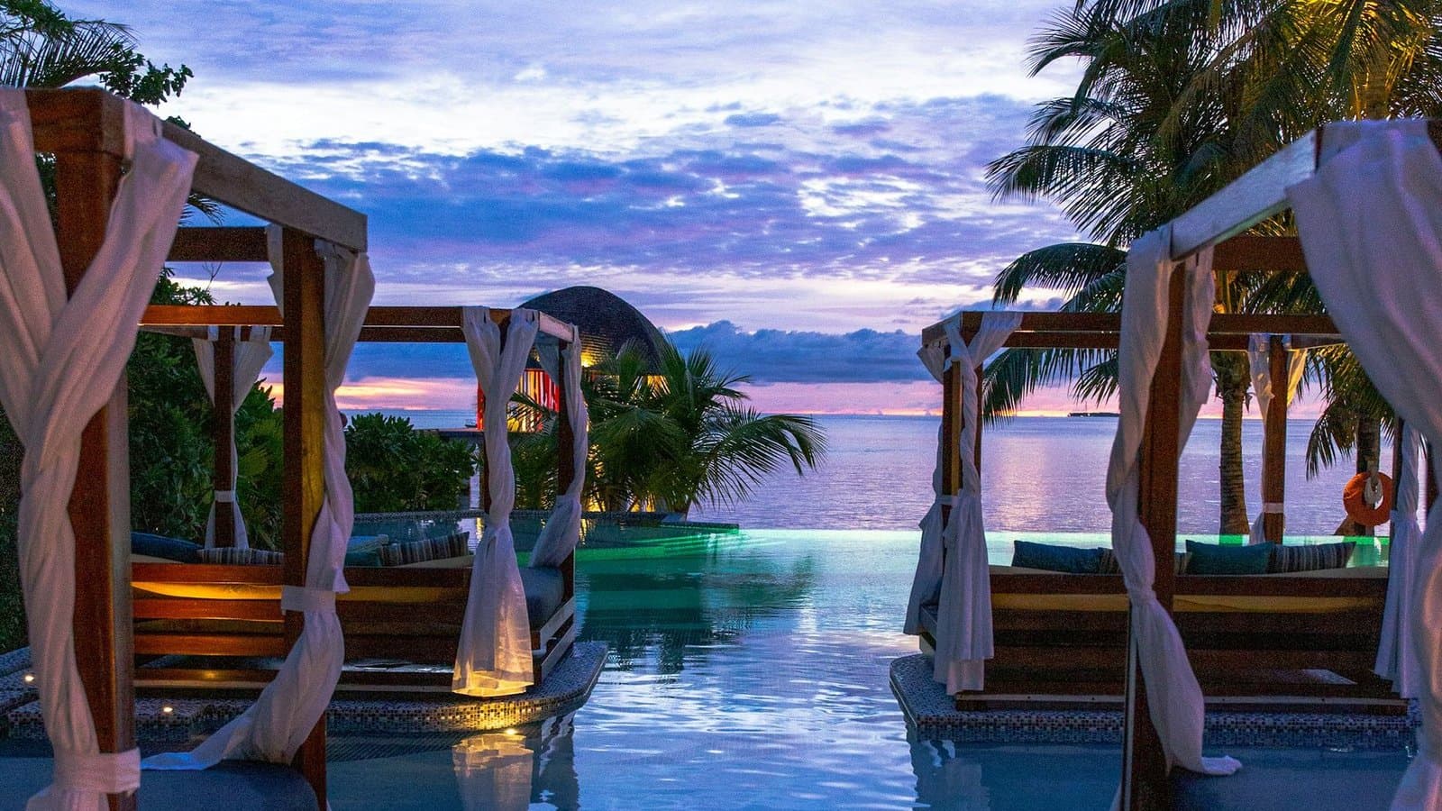 Palm-lined private pool at a Bali villa